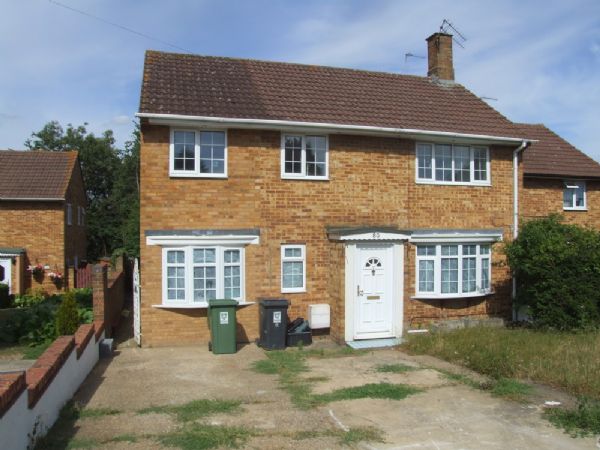 CHAULDEN - A four bedroom end of terrace property comprising; entrance hall, cloakroom, two reception rooms, kitchen/diner, utility, conservatory, four bedrooms, family bathroom, driveway/garage and offered with No Upper Chain. - Photo 1
